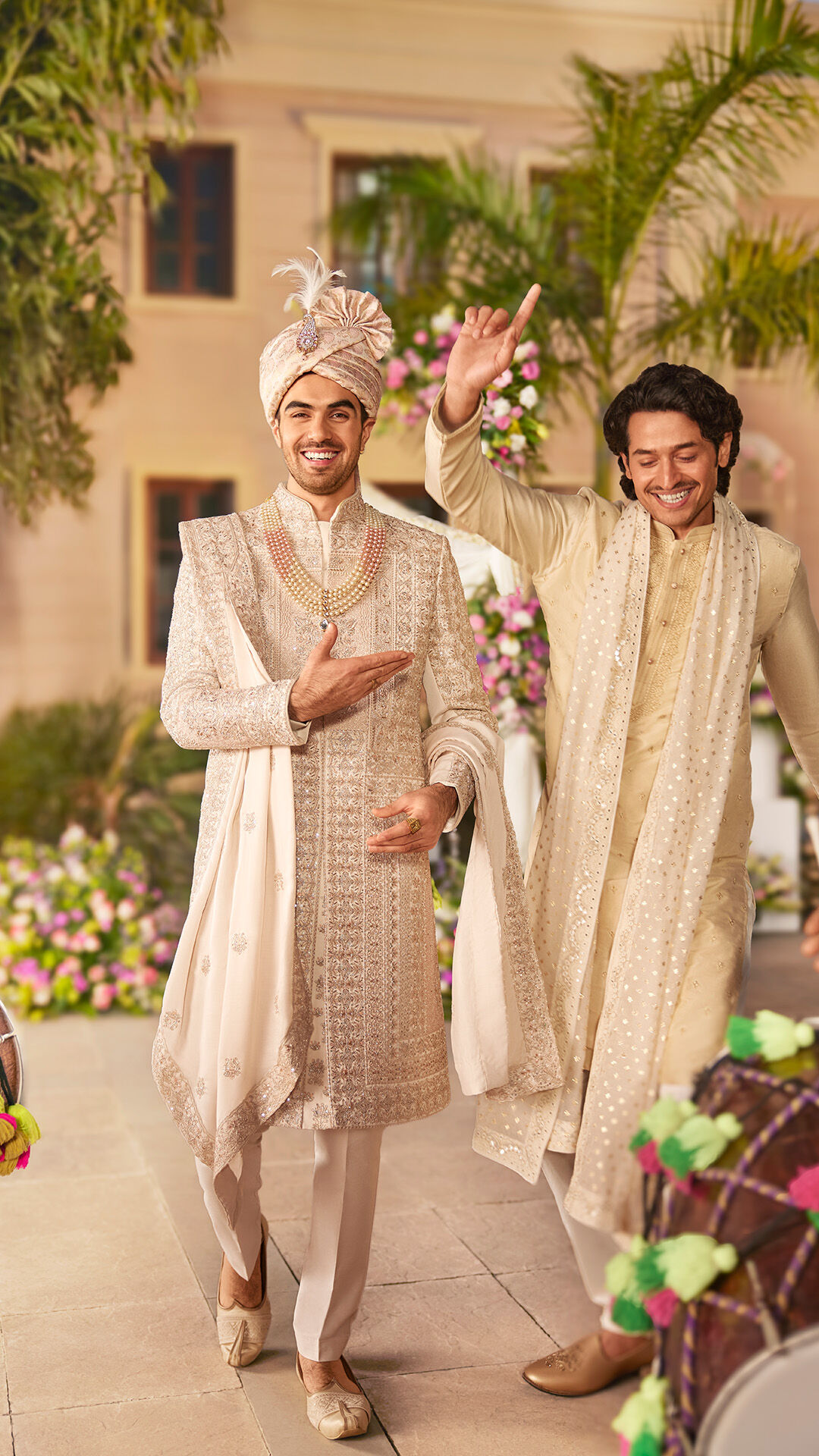 Groom and grooms men dancing in wedding wearing traditional wedding sherwanis